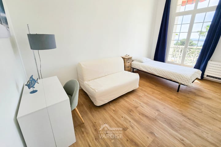 2nd bedroom equipped with a desk for remote work.