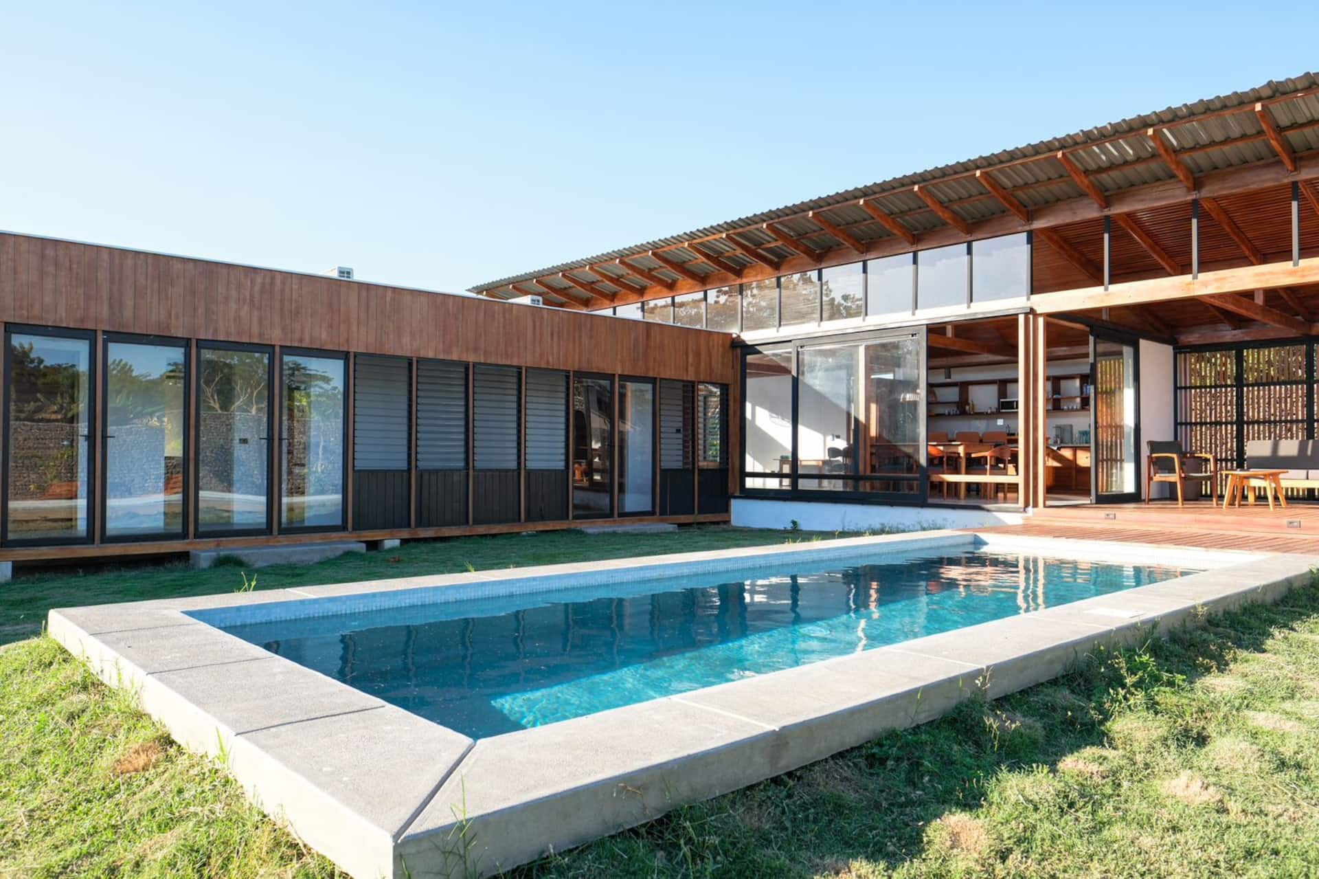 Boom beachfront new modern home w/ pool AC & solar