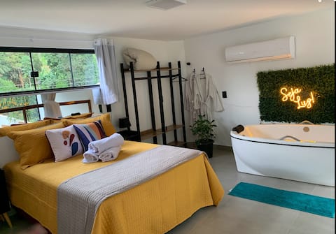 New Loft facing the creek with hot tub