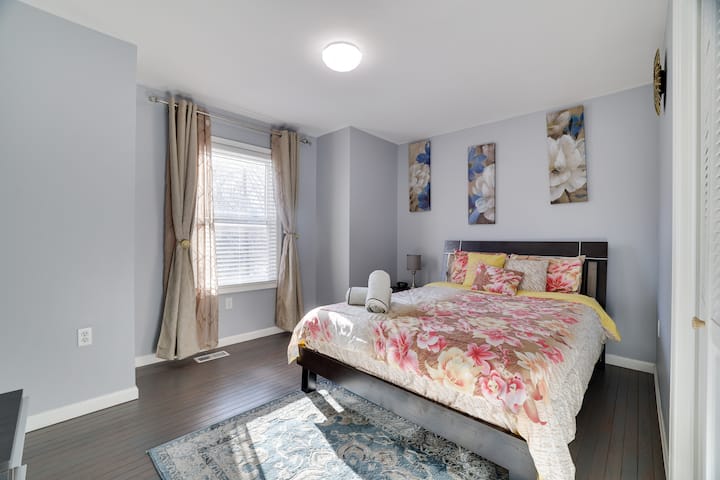 Indulge in the luxury of a queen-sized bed with high-quality linens