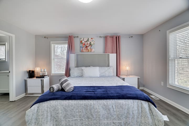 Indulge in luxury and comfort in our spacious master bedroom featuring a plush king-size bed and a spa-like ensuite