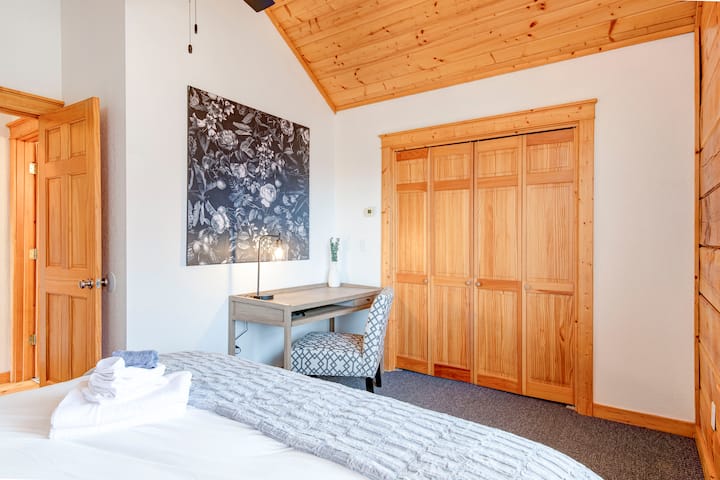 Bedroom 2 is upstairs, and includes a desk in case you’d like to do some work while you stay.