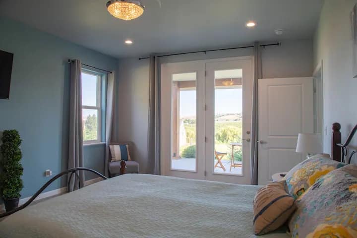 One of TWO matching (but mirrored) King Master Suites!  This is our "Sunrise Suite" as morning sun bathes the room!  Real gas fireplace is included!