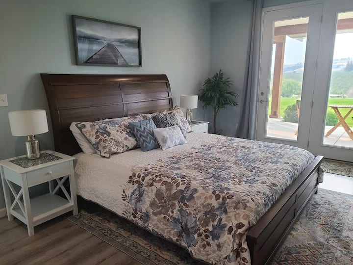 Our "Sunset Suite" (also a King Bed Master Suite) invites the many stunning sunsets to enter the room!  We also supply a rollaway for an extra guest.