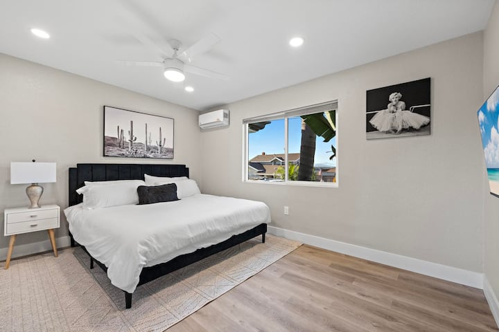 This is the Marilyn Monroe bedroom with king bed, closet & TV