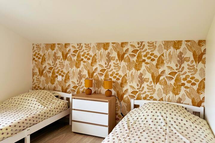 Chambre avec 2 lits simples
