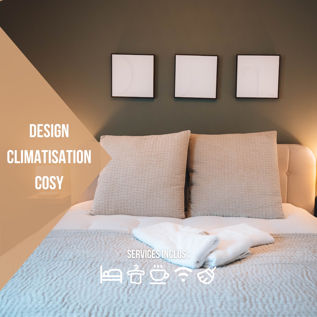 A cozy bedroom features a spacious bed with soft, neutral-toned bedding. Two large cushions add comfort, and framed art pieces are displayed above the headboard. A light-colored throw is neatly arranged at the foot of the bed, enhancing the room's inviting feel.