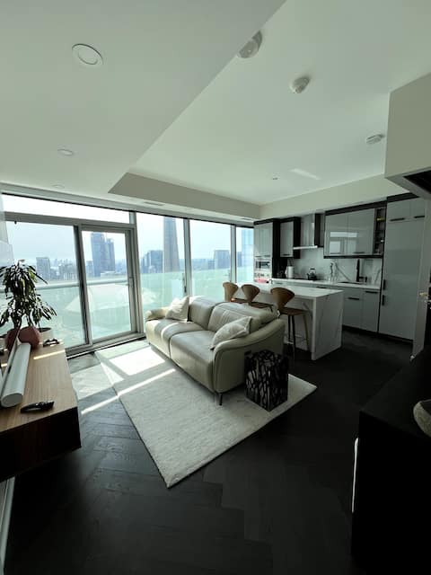 Top performing Airbnb: 44th Floor | CN Tower + Lake Views | RH Luxury 2BR in Downtown