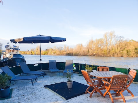 120m² calm and green barge on the banks of Seine