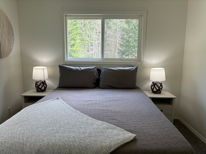 Bedroom #1, Queen Bed with desk in corner.