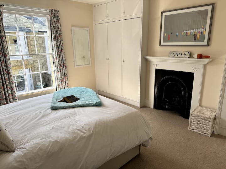 There is plenty of storage in the fitted cupboards and lots of light through the main window most of the day.
