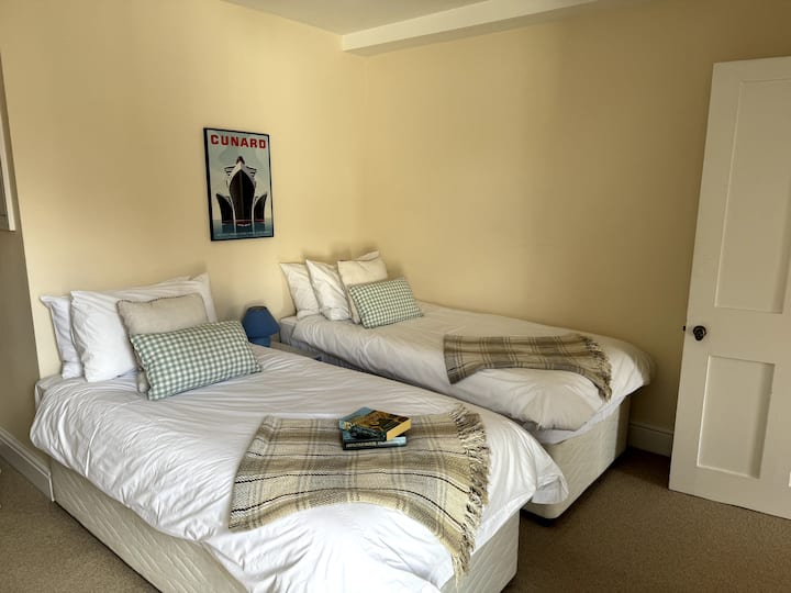 The second bedroom is also well proportioned with twin beds.
