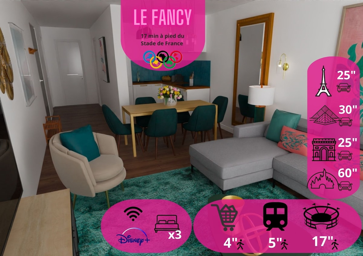 A cozy living area features a modern sectional sofa, a small table, and a dining table surrounded by teal chairs. The room is adorned with a colorful rug, and a television is positioned against the wall, creating a welcoming space for relaxation and dining.