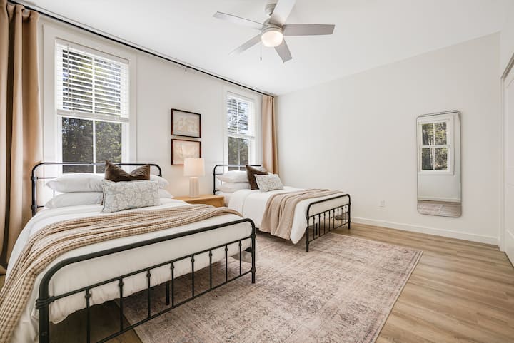 Relax in the thoughtfully crafted main-level bedroom, where two full-size beds provide comfort and tranquility for a restful stay.