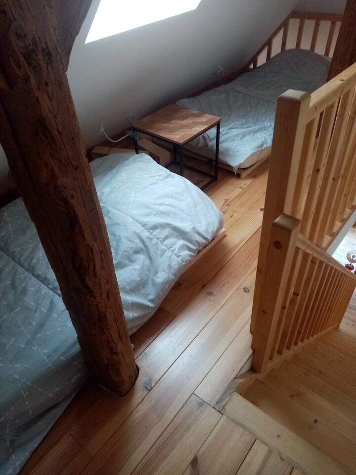 Las dos camas del mezzanine