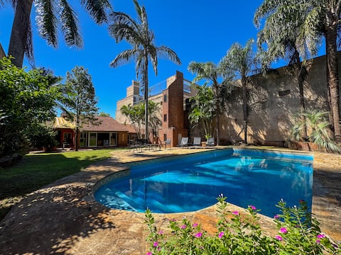 House with large garden and pool