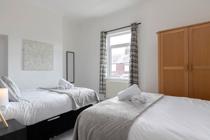 With two comfy double beds, this spacious room offers plenty of comfort and space for relaxation, whether you're sharing with a friend or enjoying extra room to spread out