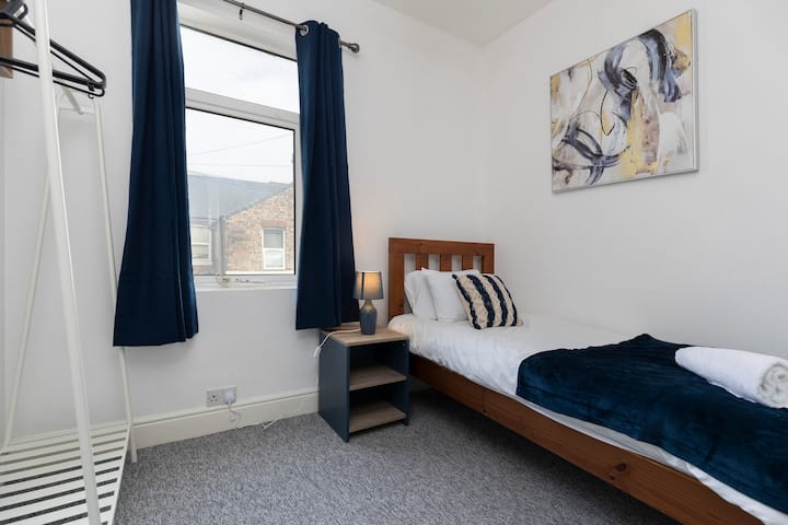 Relax and unwind in a cosy single bed, your personal haven for a peaceful night’s sleep or quiet downtime