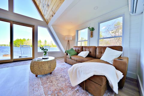 Successful Airbnb property: Modern 1970s A-Frame | Hot Tub | Kayaks | Lakeside in Bangor