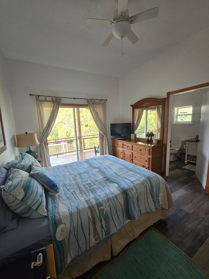 Master bedroom ensuite bathroom, river to the left 