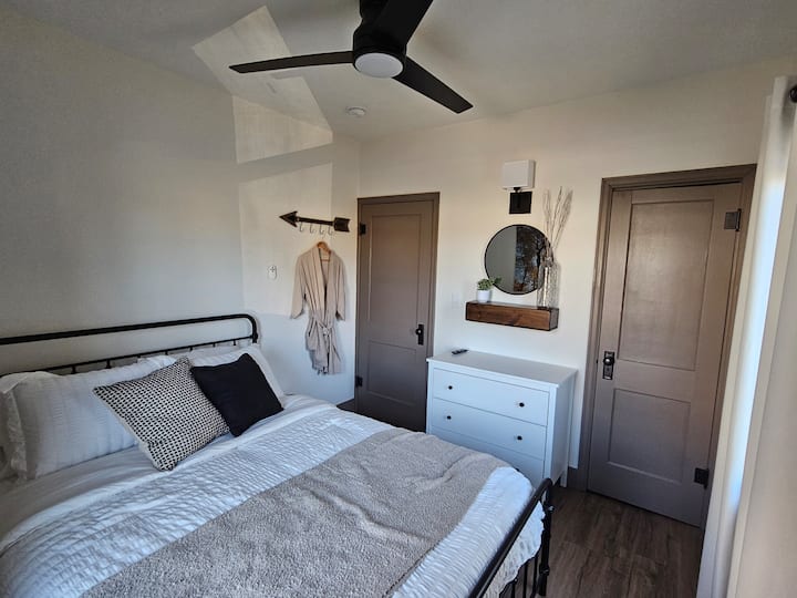 Queen bed, smart TV, dresser, hamper, robe, ceiling fan are all included for your comfort.