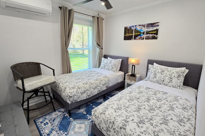 Third bedroom with two twin bedroom, closet, widow wall.