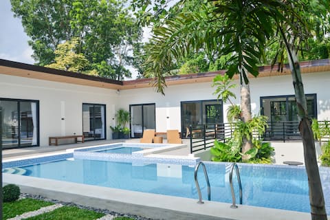 Tropical Haven: Infinity Pool Next to Nature