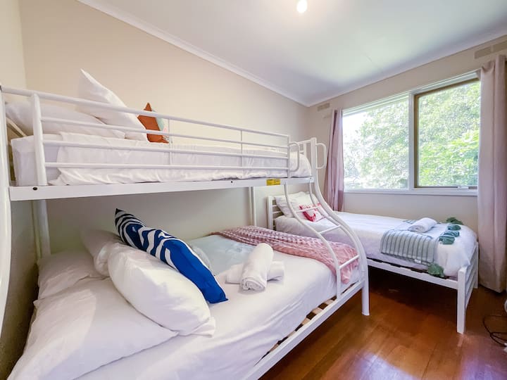 The 3rd bedroom upstairs has a double bed and 2 single beds. Great for kids and for extra friends! 
