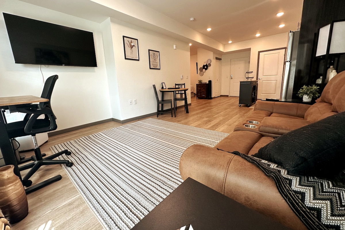 You will find a 55" Smart TV for streaming all your favorite shows in the living room.