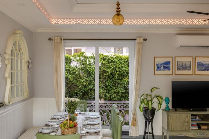 Cozy dining space with garden views, ideal for a peaceful meal.