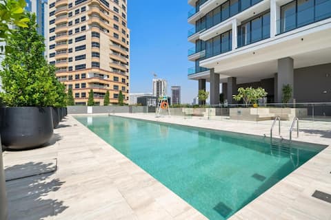 High Speed WiFi · Pool & Balcony · 1BR JVC