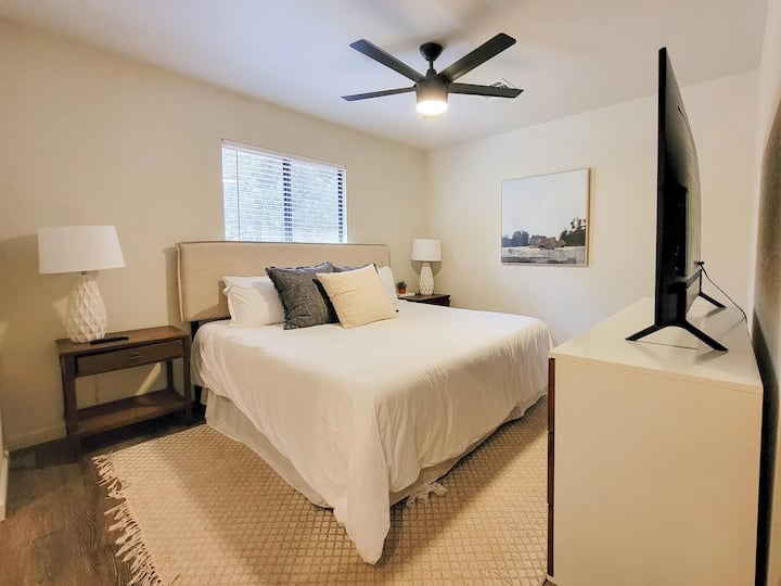 Master bedroom with king-sized bed.