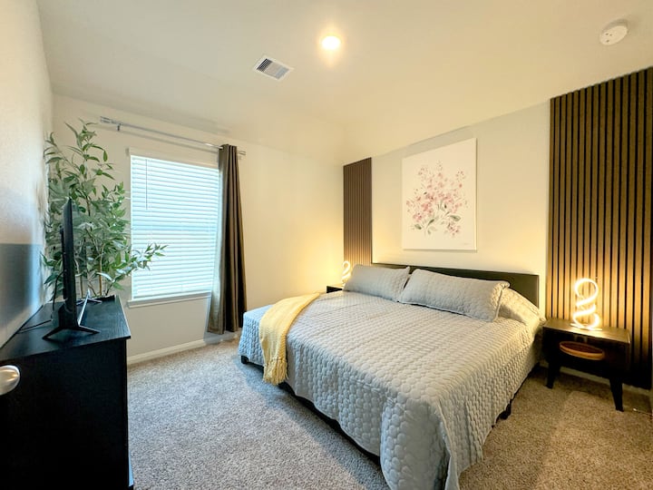 Another kind bedroom with 4K TV