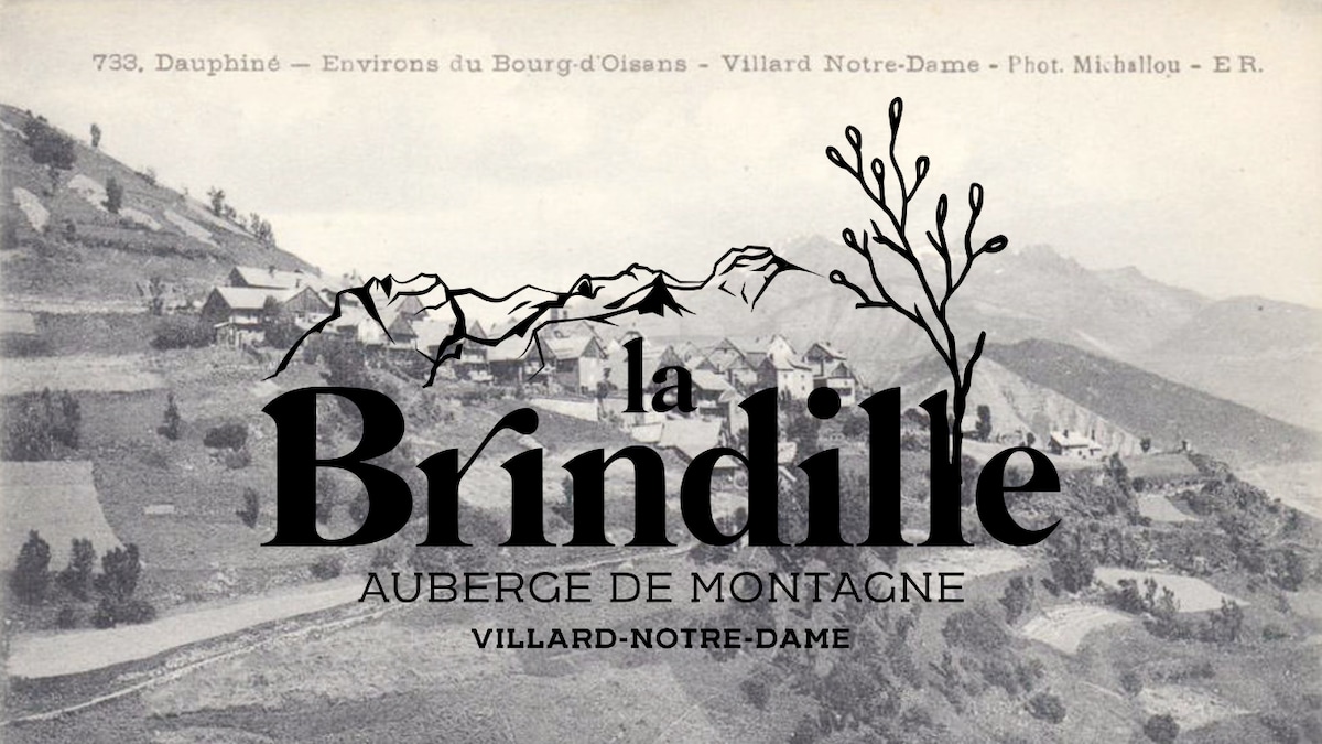 An historic black and white photograph features a mountainous landscape with a cluster of buildings nestled among rolling hills. The name 'La Brindille' and 'Auberge de Montagne' are prominently displayed, adding a rustic charm to the image.