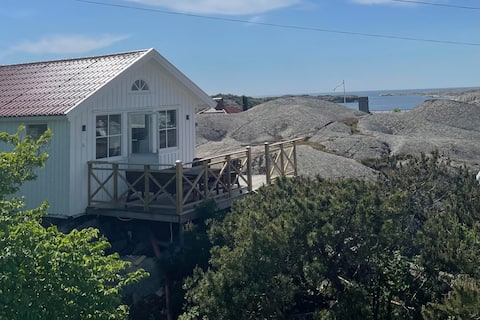 The cabin on the mountain - by the sea