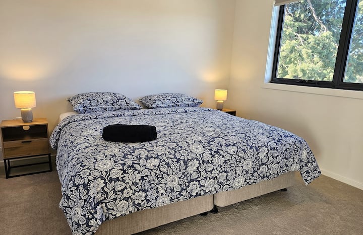 Bedroom 3 - a sizeable bedroom on the first floor with mountain views in the horizon. 2 single size bed with wardrobes. Alternative bed configuration can be arrange-queen bed - see other photo. Towels and freshly laundred linen are all provided. 