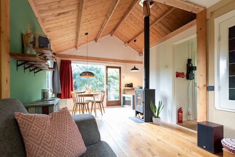 Cozy forest cottage with bicycles