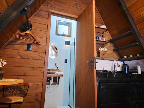 Top performing Airbnb: Swiss Chalet - Zen cabin with fireplace in Cunha in Cunha