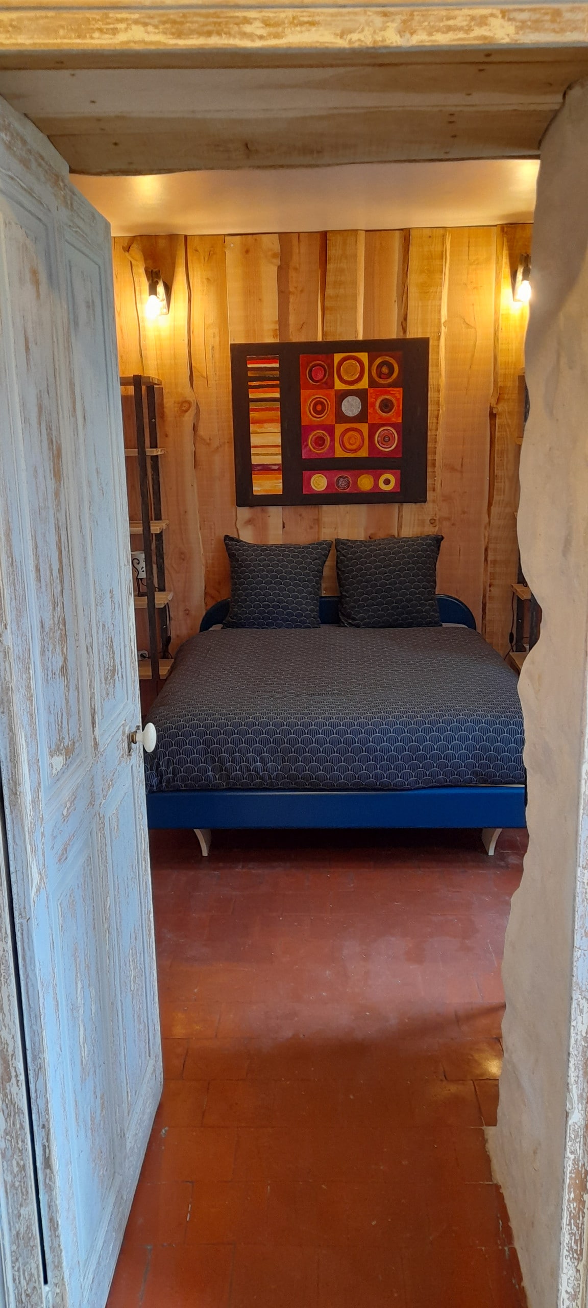 double bed, desk, storage shelf.