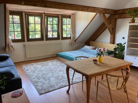 Top floor apartment with free parking