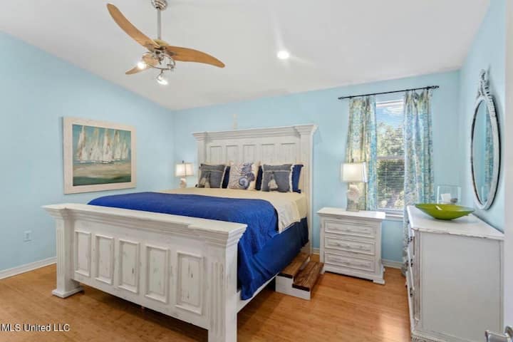 Master Bedroom with King Bed, ensuite, and walk in closet.