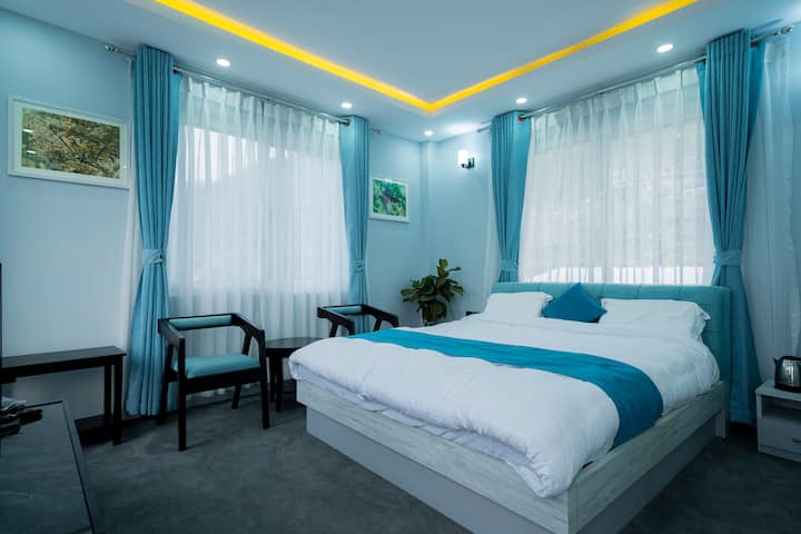 This is one of our premium rooms, Located in the top floor of GurjeHome, bathroom with premium bathtub is also attached with the room. This is perfect for couples and upto 3 people can also use this room to stay with extra mattresses. 