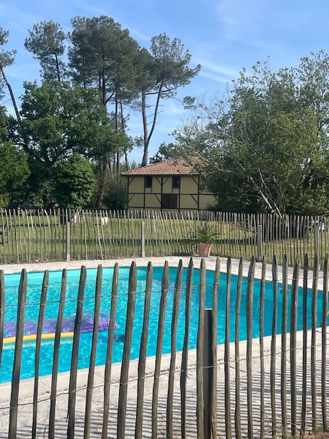 Landaise near ocean , pool