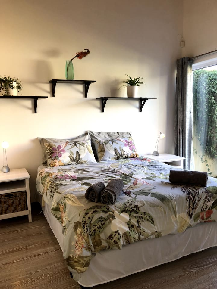 S[acious bedroom with double bed and private patio to the garden.