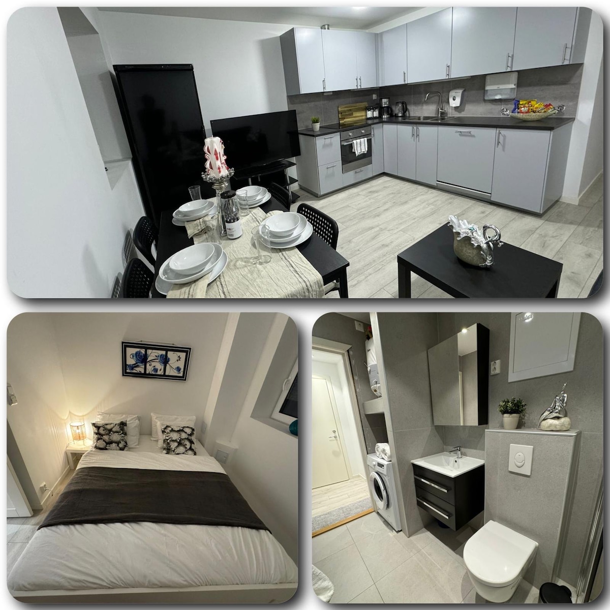 A modern kitchen is equipped with sleek cabinetry, a refrigerator, and a dining table set for four. A cozy sleeping area features a large bed with decorative pillows. The bathroom includes a stylish vanity and washing machine, enhancing convenience for guests.