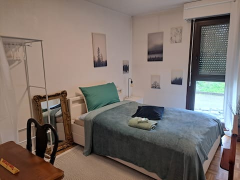 Beautiful room in large apartment with garden