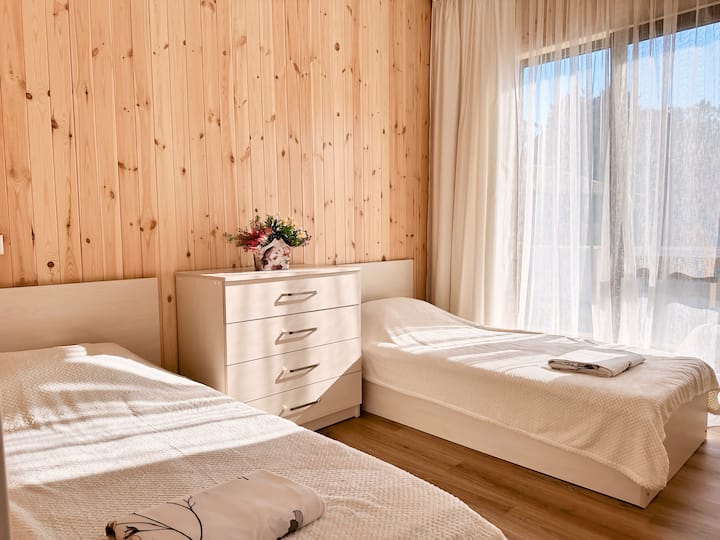 Bedroom #2 on the 2nd floor with a balcony