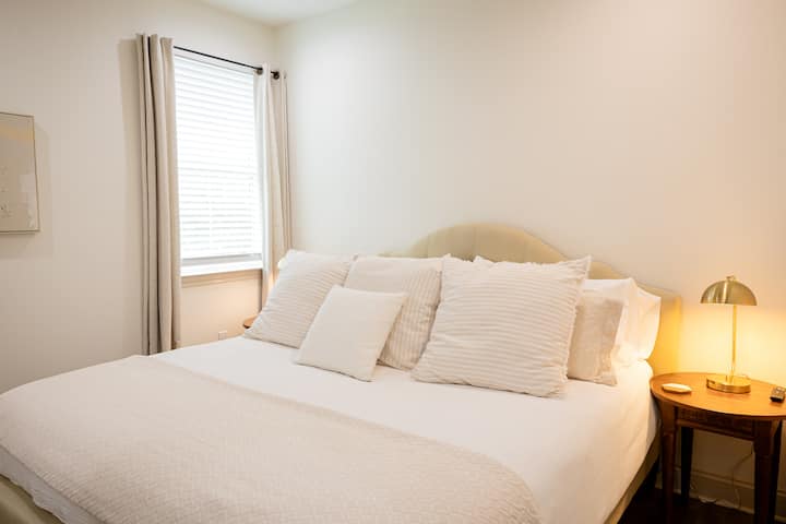 The upstairs king bedroom has its own private bathroom, closet, and smart TV as well.