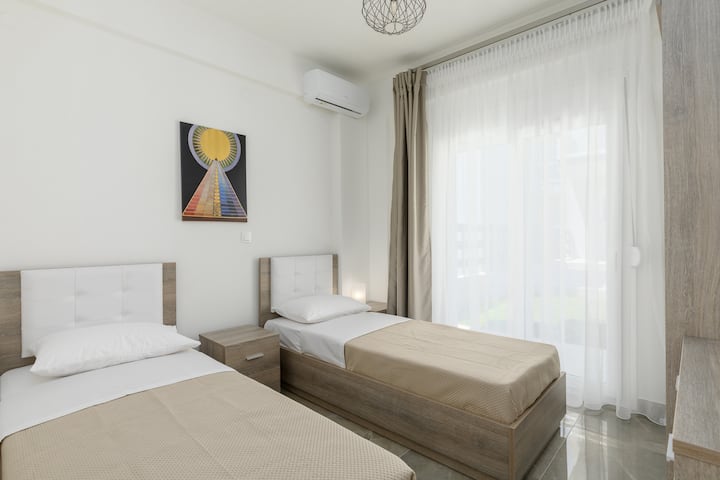 Spavaća soba s krevetima za jednu osobu