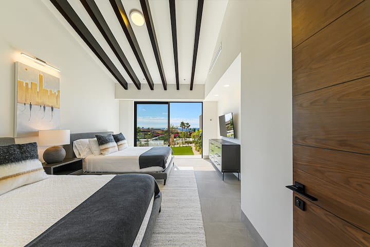 The fun never stops in the bedroom with two queen beds.